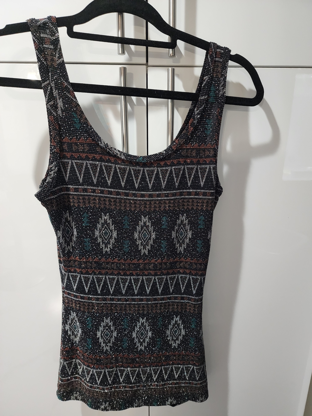 BKE Black Knit Top with Teal & Rust Geometric Design